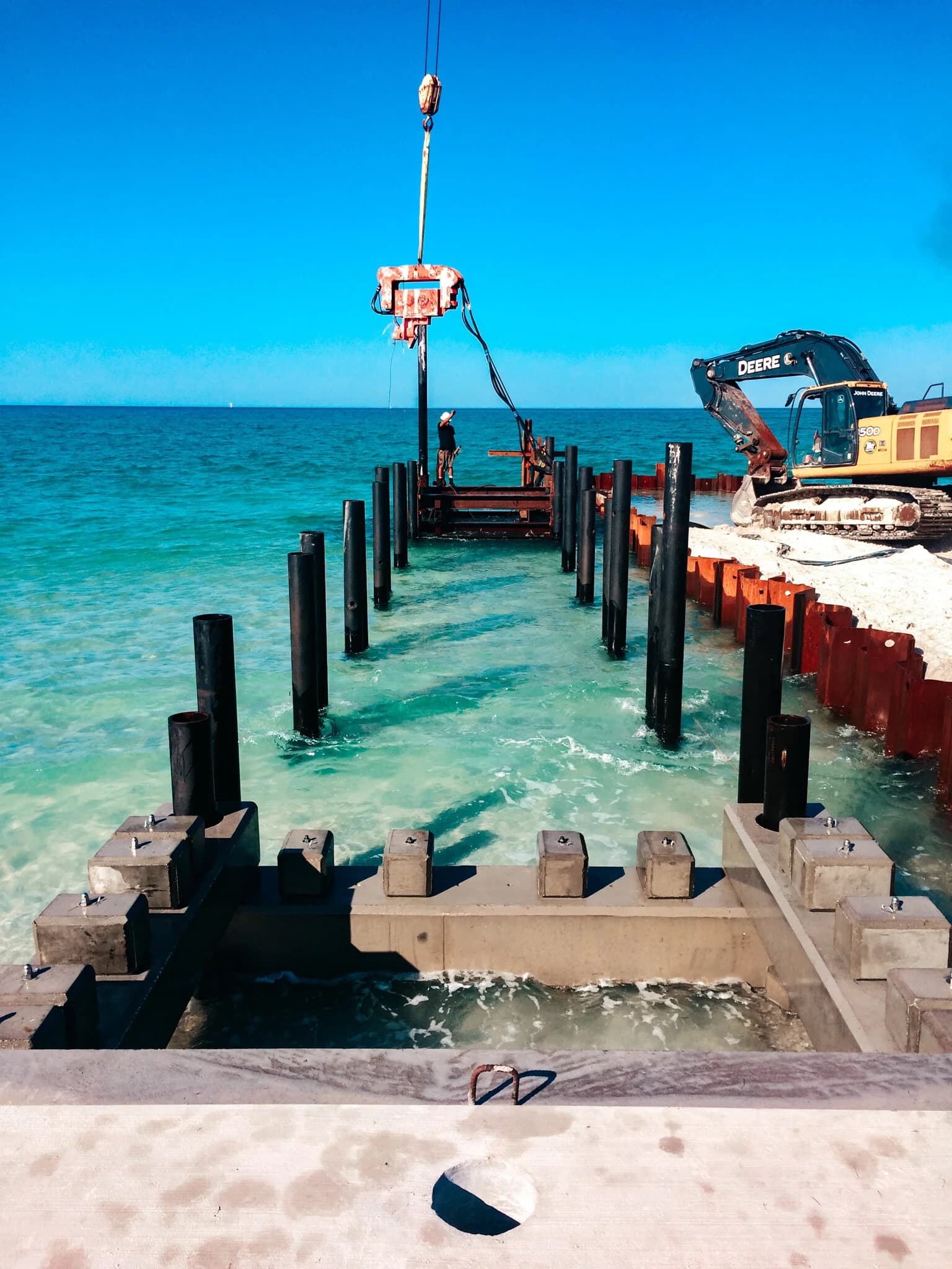 Construct Co. crew driving piles on the Longboat Key shoreline stabilization project